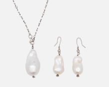 A large cultured baroque pearl pendant, on a baroque pearl necklace, silver mounted. Together with a
