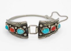 A native American Navajo silver turquoise and coral set bracelet, probably by Jerome Begay.