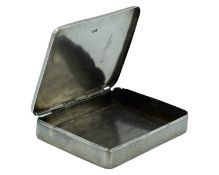 A George VI silver cigarette box by S J Levi & Co, retailed by Alfred Dunhill, London.
