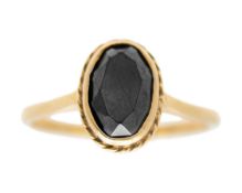 A 9k hematite set ring.