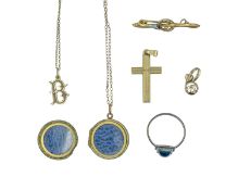A selection of gold pendants, chains and a silver ring.
