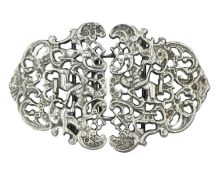 A modern silver cast and pierced nurses buckle.
