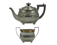 A silver teaset by George Nathan & Ridley Hayes.