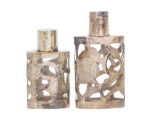 Two Mexican silver mounted scent bottles.