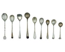 A selection of George III and later silver mustard spoons.