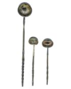 A trio of twisted baleen-handled toddy ladles.
