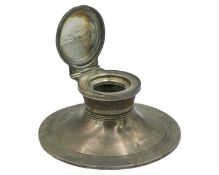 A silver capstan inkwell by William Neale.