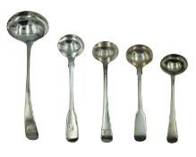 A selection of George III and William IV silver condiment spoons.