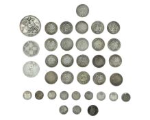 GB - A collection of Victoria silver coinage, including an 1895 crown, and two George IV shillings.