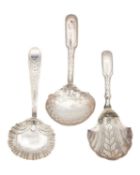 A trio of George III and later silver caddy spoons.