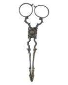 A pair of silver scissor-action tongs by John Fox (or Faux) & George Love.