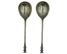 A pair of silver serving spoons by Goldsmiths & Silversmiths Co Ltd.