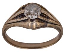 An antique silver ring, set with an old mine-cut diamond of 0.30ct estimated weight.