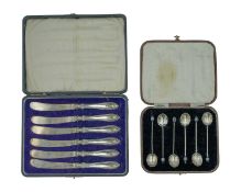 A cased set of six silver coffee spoons by C. W. Fletcher & Son Ltd.