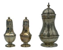 A pair of silver sugar casters by William Hutton & Sons Ltd.