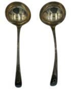 A pair of silver Old-English pattern sauce ladles.