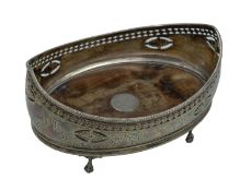 A George III silver cruet stand.