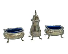 A silver three-piece cruet set by E. S. Barnsley & Co.