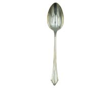 An 800 silver repose pattern serving spoon.