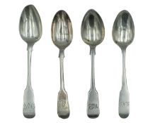 A selection of Irish and British silver fiddle-pattern teaspoons dated William IV and later.