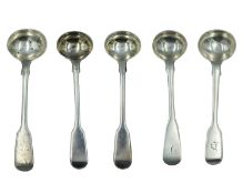 A pair of George III silver fiddle-pattern condiment spoons by William Eley I & William Fearn.