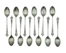 A set of twelve silver King's pattern demitasse spoons by Friedman & Gottliffe Ltd.