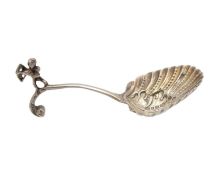 An imported Victorian silver caddy spoon by Samuel Boyce Landeck.