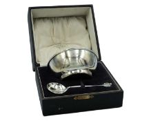 A George V silver Christening bowl by the Kemp Brothers.