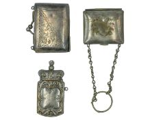 A silver-plated vesta case, and two silver-plated coin purses.