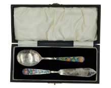 A silver butter knife set by Bernard Instone.