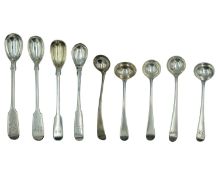 A selection of George III and later silver condiment spoons.