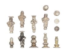 A selection of silver cutlery finials.