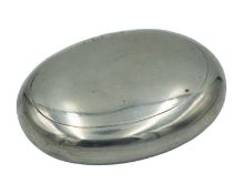 A silver tobacco box by William Neale & Sons.