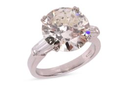 A diamond solitaire ring, featuring a transitional-cut diamond of 5.79ct, in a double claw setting, 