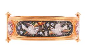 An Etruscan Revival micromosaic bangle, attributed to Cesare Roccheggiani, set with polychromatic mi