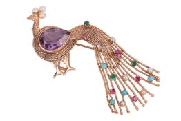 A gem-set peacock brooch, the body set with a large pear-cut synthetic colour-change sapphire, to a 