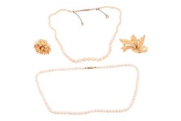 A small group of jewellery items, comprising two cultured pearl necklaces, together with two gilt br