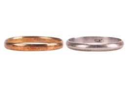 Two wedding bands; one stamped 'PLAT' in size P½, 2.5 grams; another band with rubbed British hallma