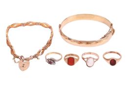 A small group of jewellery items, comprising a Victorian carnelian-set ring in 9ct gold, size H1/2, 