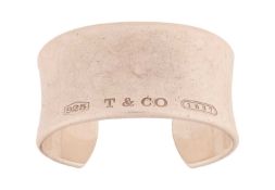 Tiffany & Co. - An '1837' cuff bangle, the slightly convex wide band signed and stamped '925' to