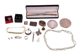 A silver compact, another in Art Deco taste, a silver pill box, another wth gilded interior and a sm