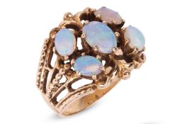 An opal cluster ring, the openwork mount with beaded details, claw-set with five precious opal caboc