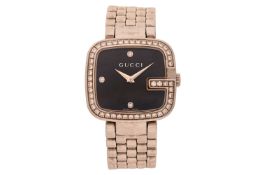 Gucci – A Diamond-set ‘G’ Wristwatch Reference: 125.4 (Case Back marked internally ‘2459’ and ‘07/13
