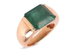 An emerald dress ring, featuring a deep green coloured emerald with sub-translucent transparency, ap