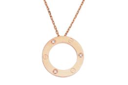 Cartier - a 'Love' pendant on chain, set with three brilliant-cut diamond accents, the annulet penda