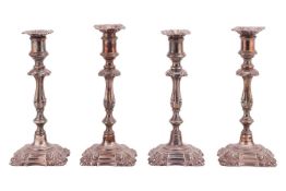 A set of four Victorian Elkington & Co of Birmingham EPNS table candlesticks of George II style 