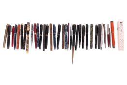 A group of vintage fountain pens including, a Parker (Canada) 5-16 