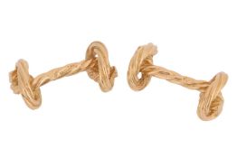 A pair of 'Marine knot' cufflinks, textured and terminated with nautical rope knot motifs, yellow me