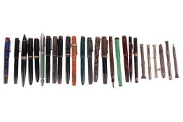 A group of vintage fountain pens, including a Parker 