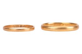 Two 22ct yellow gold wedding bands, of plain polished finish, court-profile, one in size M and the o